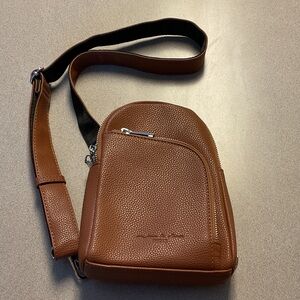 Inicat Crossbody Bag